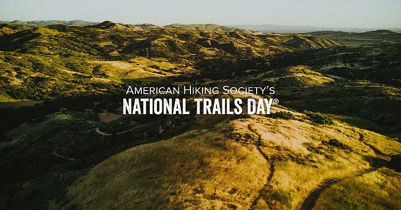 American Hiking Society's National Trails Day® 2022 grassy trail aerial sunset