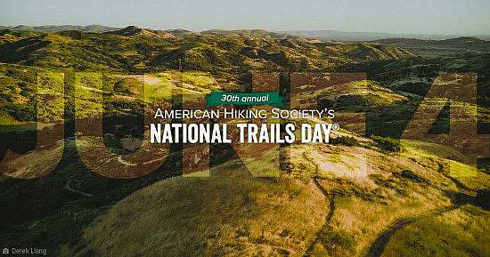 American Hiking Society's National Trails Day® June 4 2022 grassy trail aerial sunset