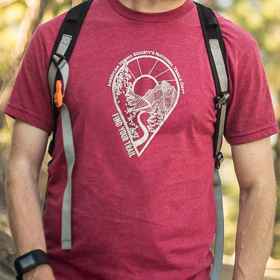 red t-shirt with a location pin trail graphic