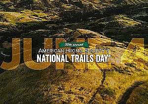 American Hiking Society's National Trails Day® June 4 2022 grassy trail aerial sunset